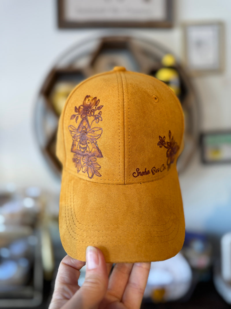 Hand burned cork hats by Piper