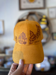 Hand burned cork hats by Piper