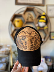 Hand burned cork hats by Piper